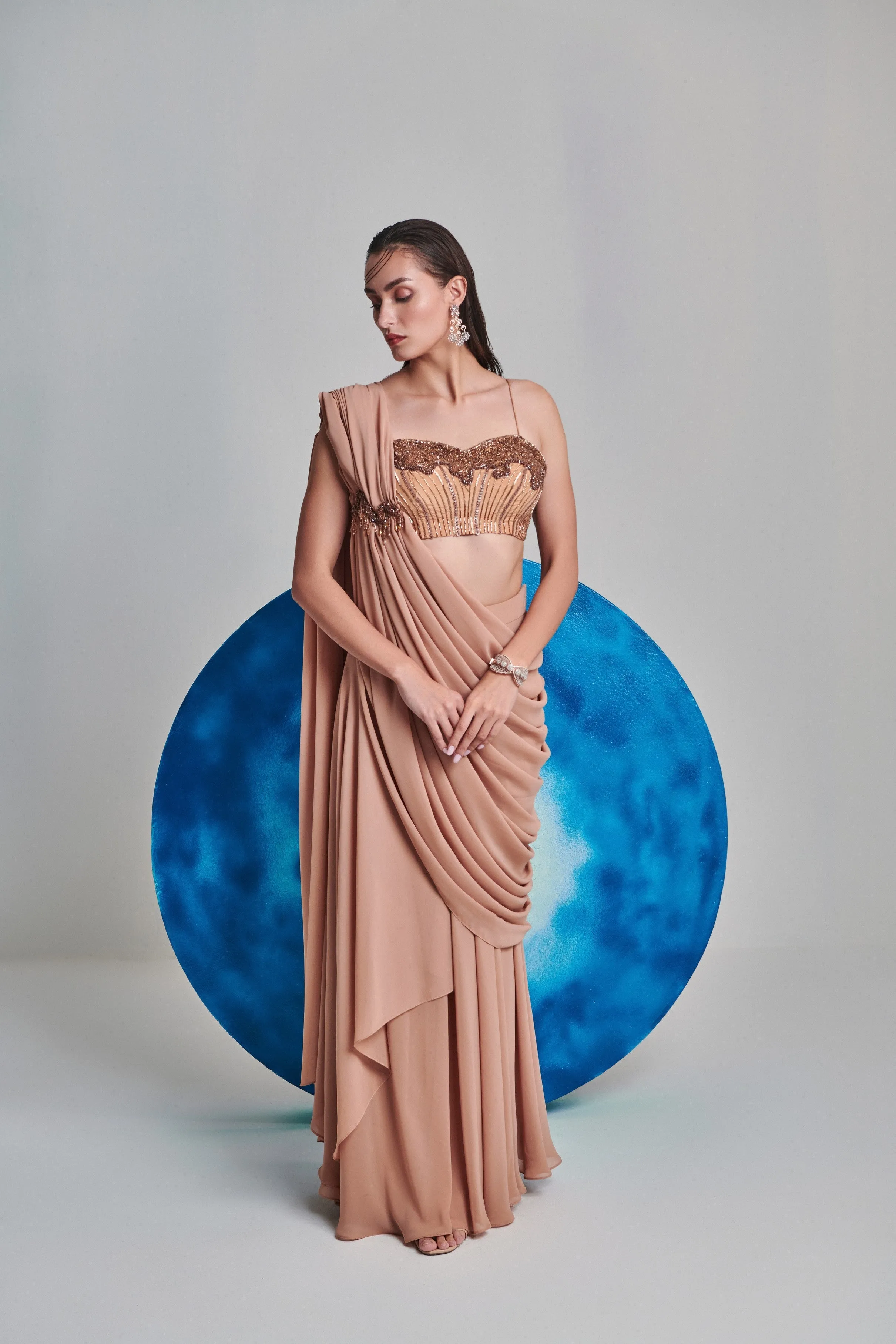 Beige flared pre stitch drape saree; hand embroidered blouse