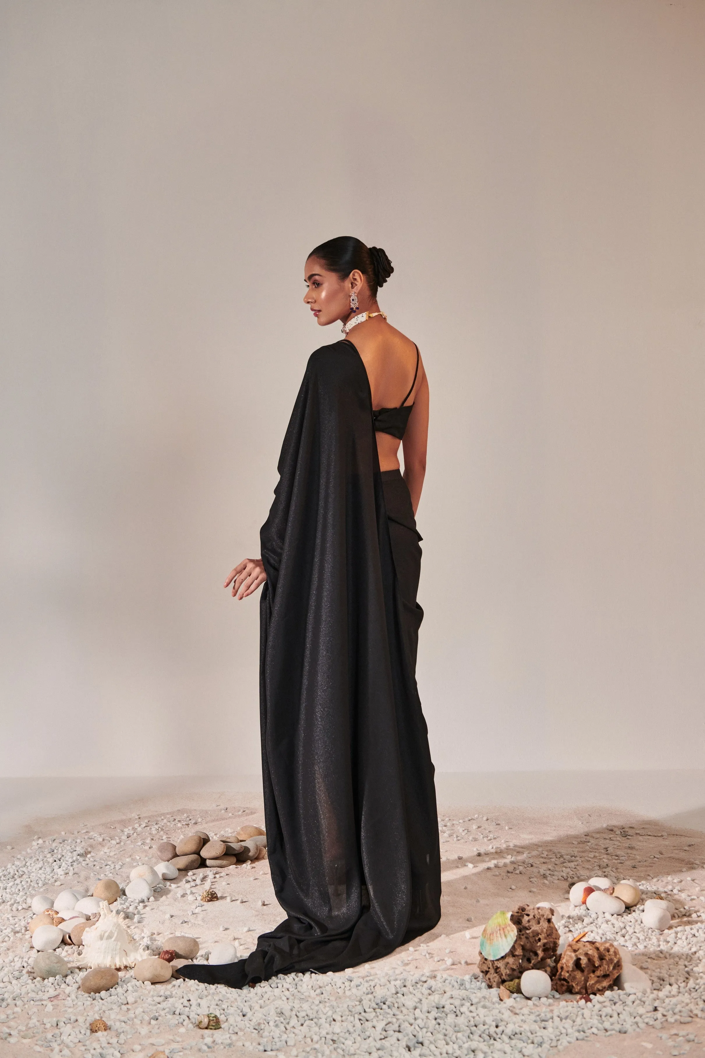 fuss-free pre-stitched drape saree; hand embroidered blouse and feather detailing